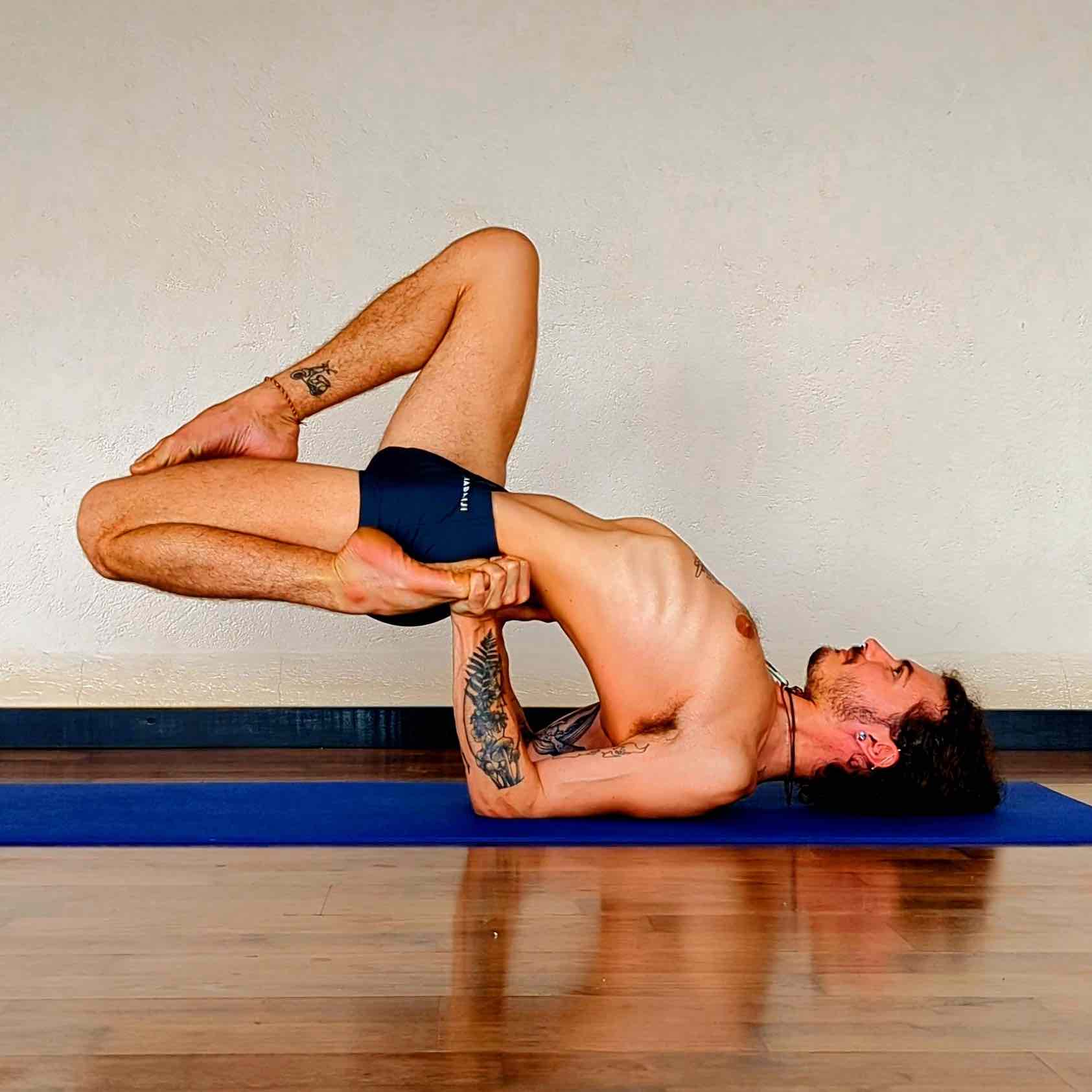 Aris Papas in yoga pose